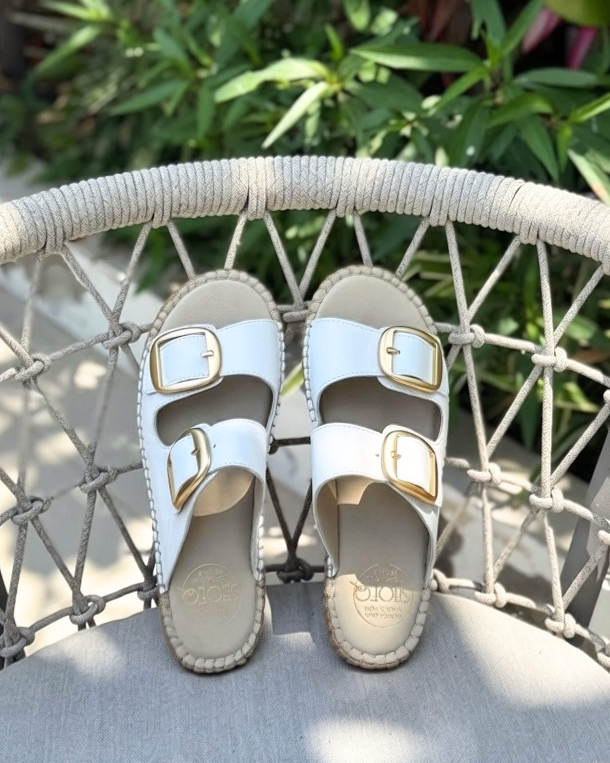 Handmade white leather espadrille slides with double gold buckle straps and jute rope sole | Urban Espadrille Slide by Shoeq Dubai