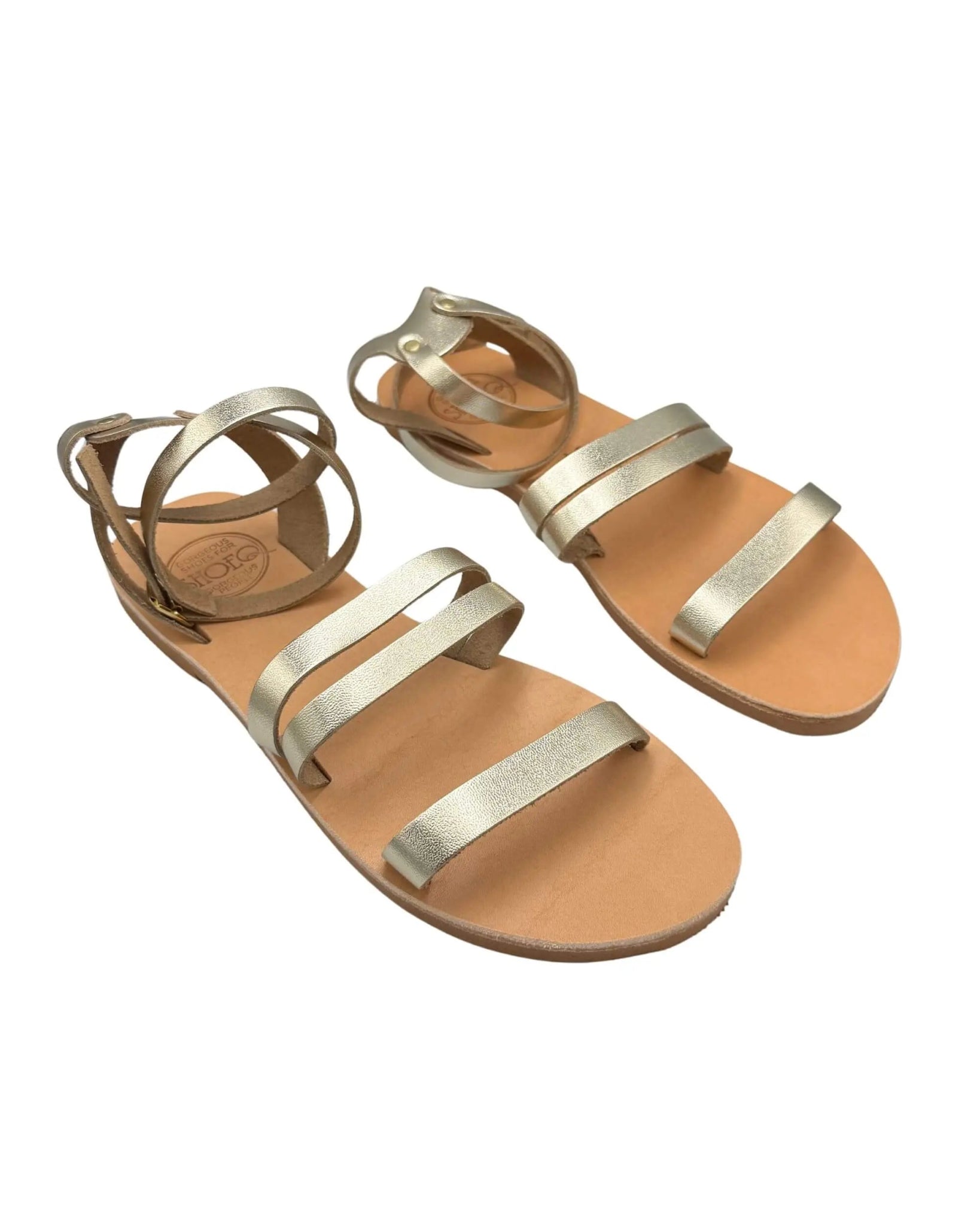Barefoot flat sandals champagne gold Dubai beach lifestyle