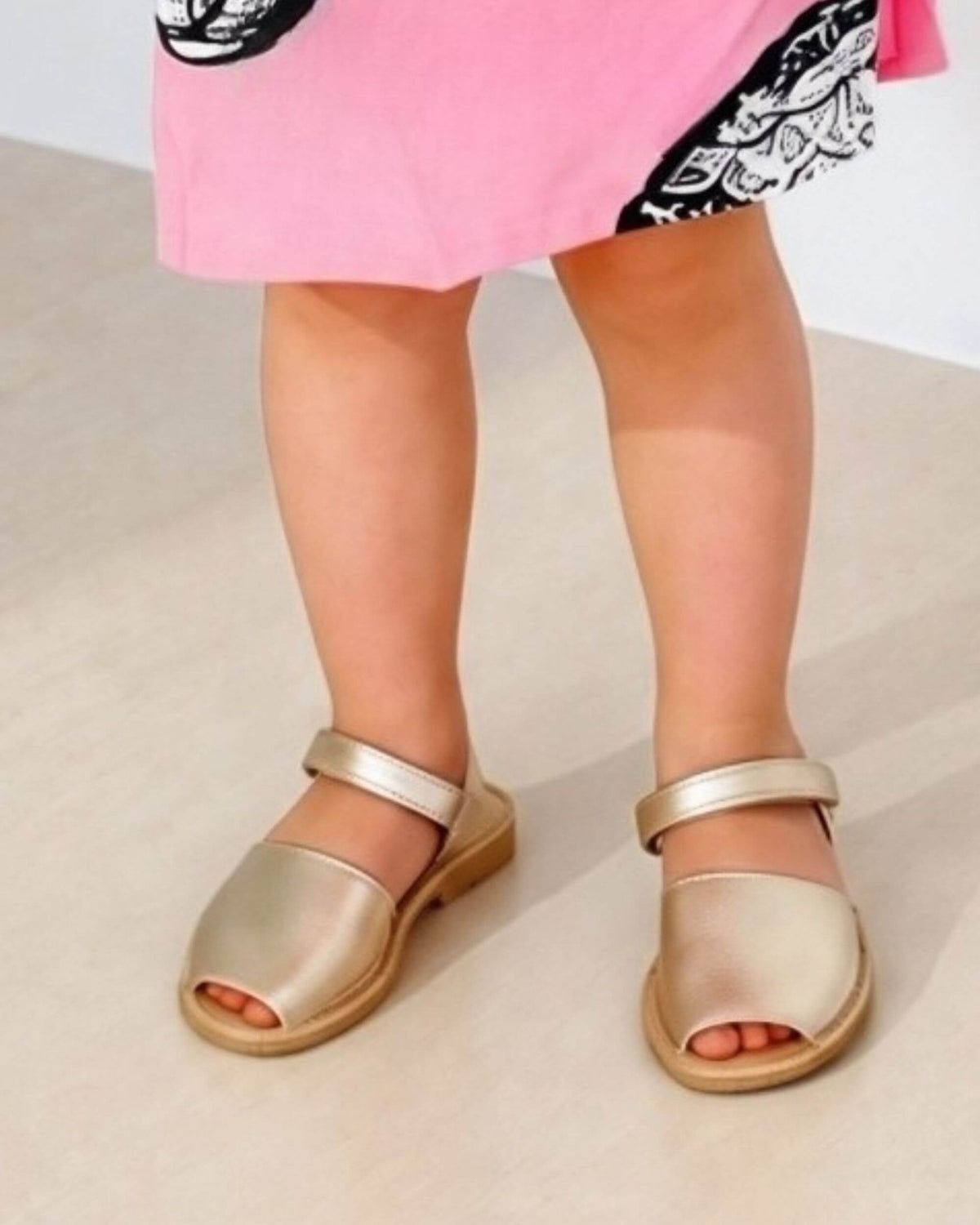 Champagne gold kids leather sandals with a buckled ankle strap, handmade in Menorca, Spain | Girls Ankle Strap Avarca by Shoeq