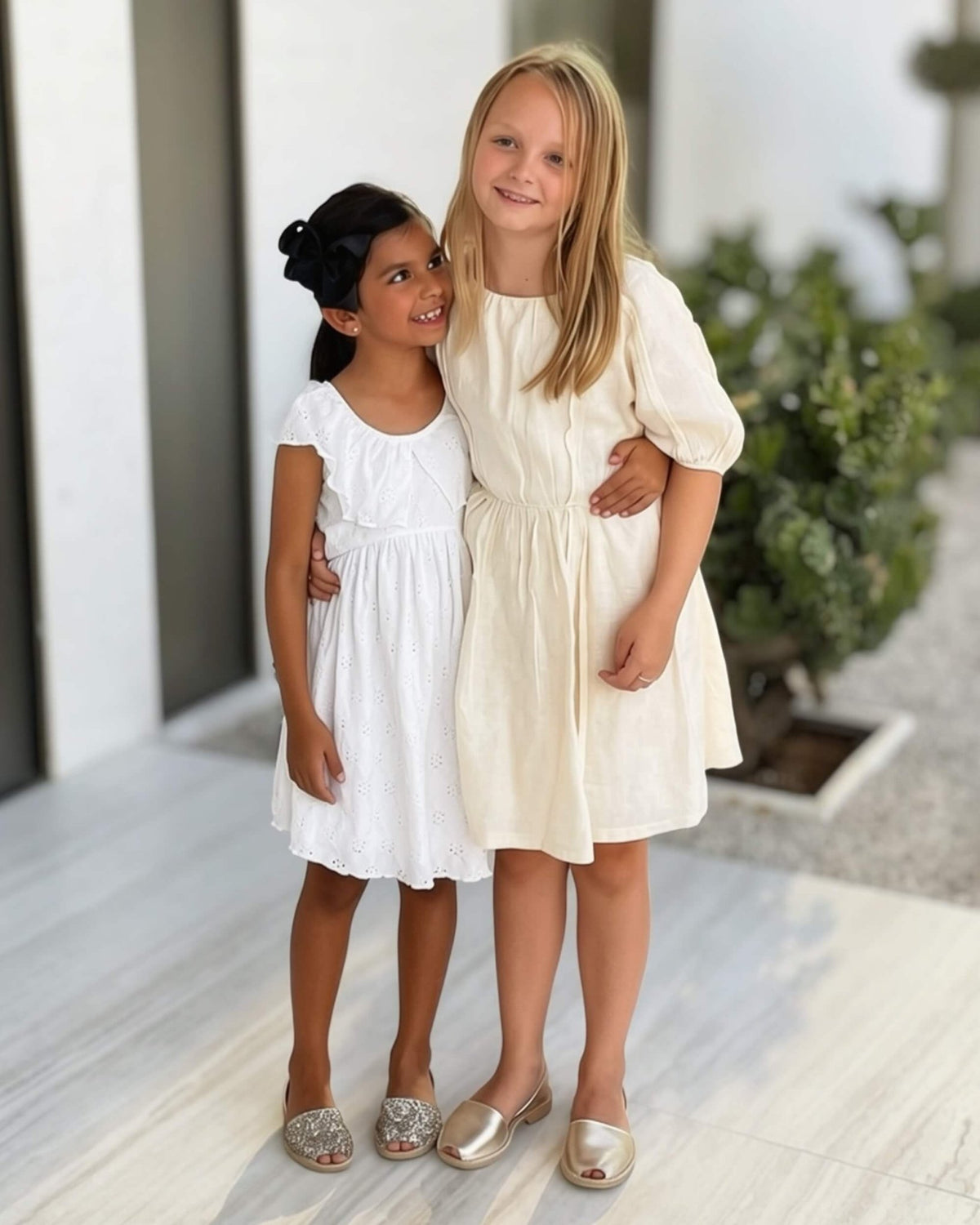 Gold glitter kids leather sandals on models with leather, rubber sole and a secure strap | Girls Classic Avarca by Shoeq