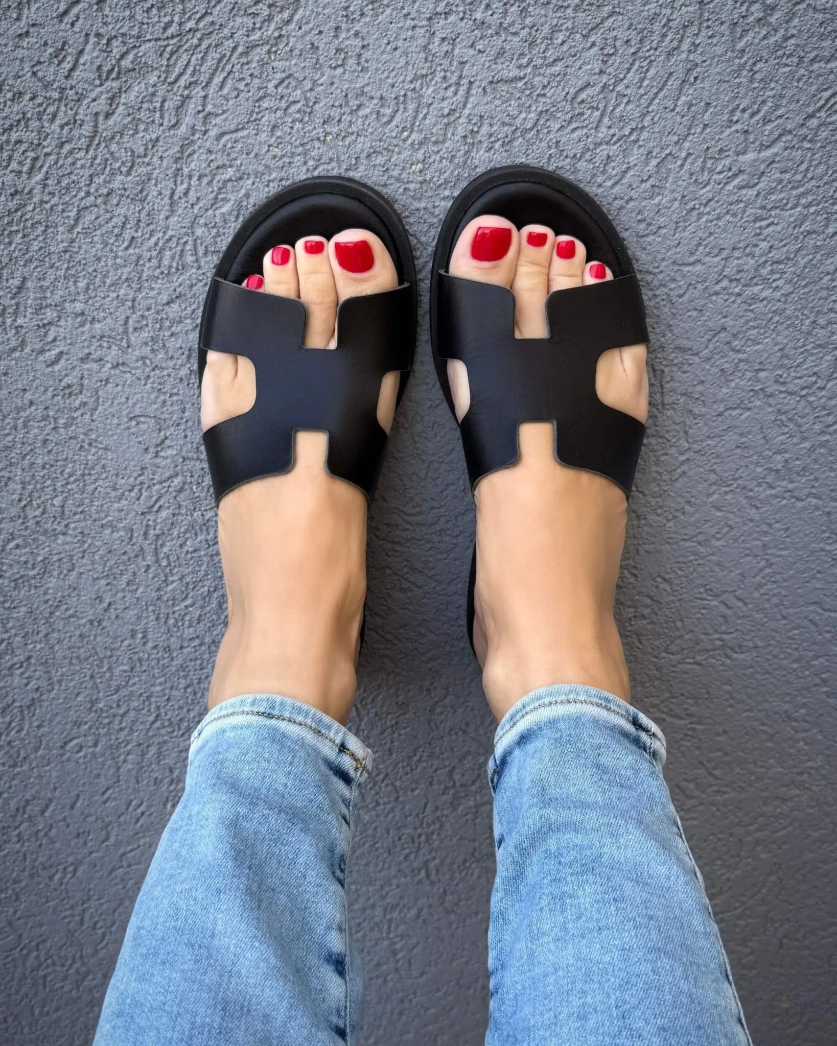 Greek artisan black slides on model Dubai comfortable versatile