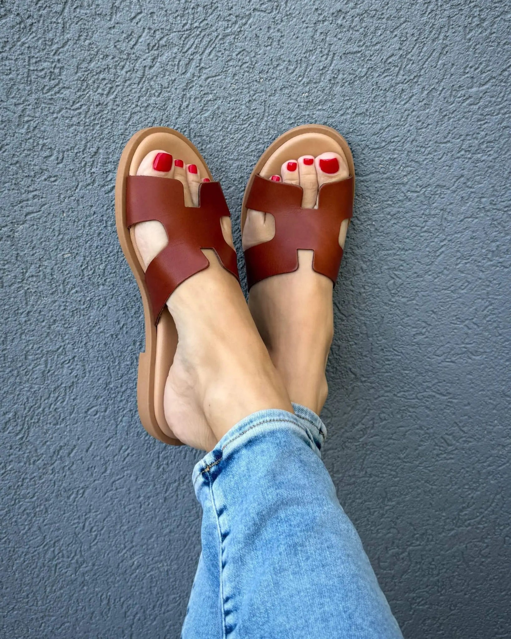 Greek artisan chocolate brown slides on model Dubai comfortable