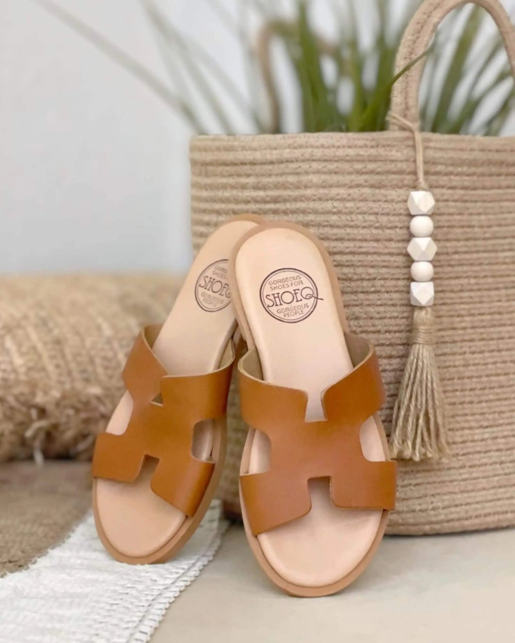 Tan leather flat slides Dubai smart casual comfortable neutral