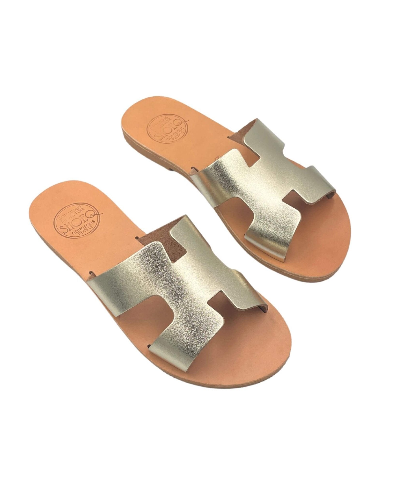 Hania Slide champagne side view premium metallic leather
