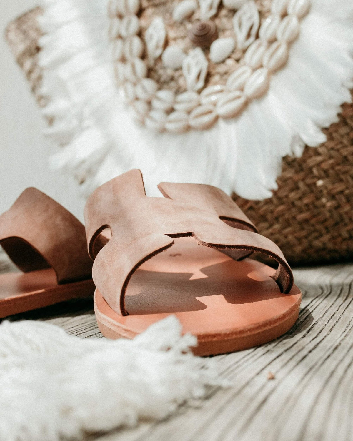 Close-up of brown nubuck flat sandals — soft leather and hand-stitched finish | Hania Slide by Shoeq