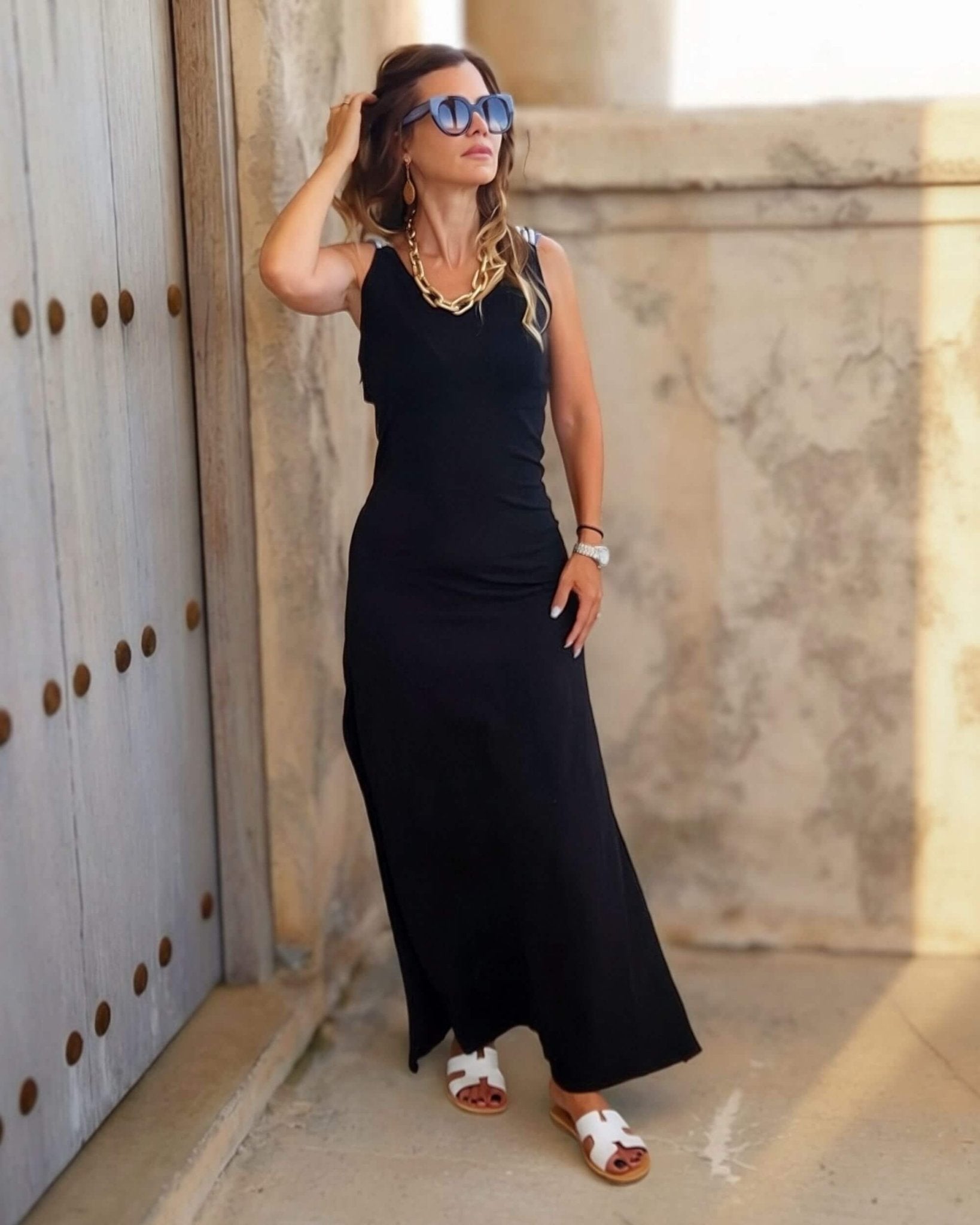 Hania white leather slides on model lifestyle Dubai summer
