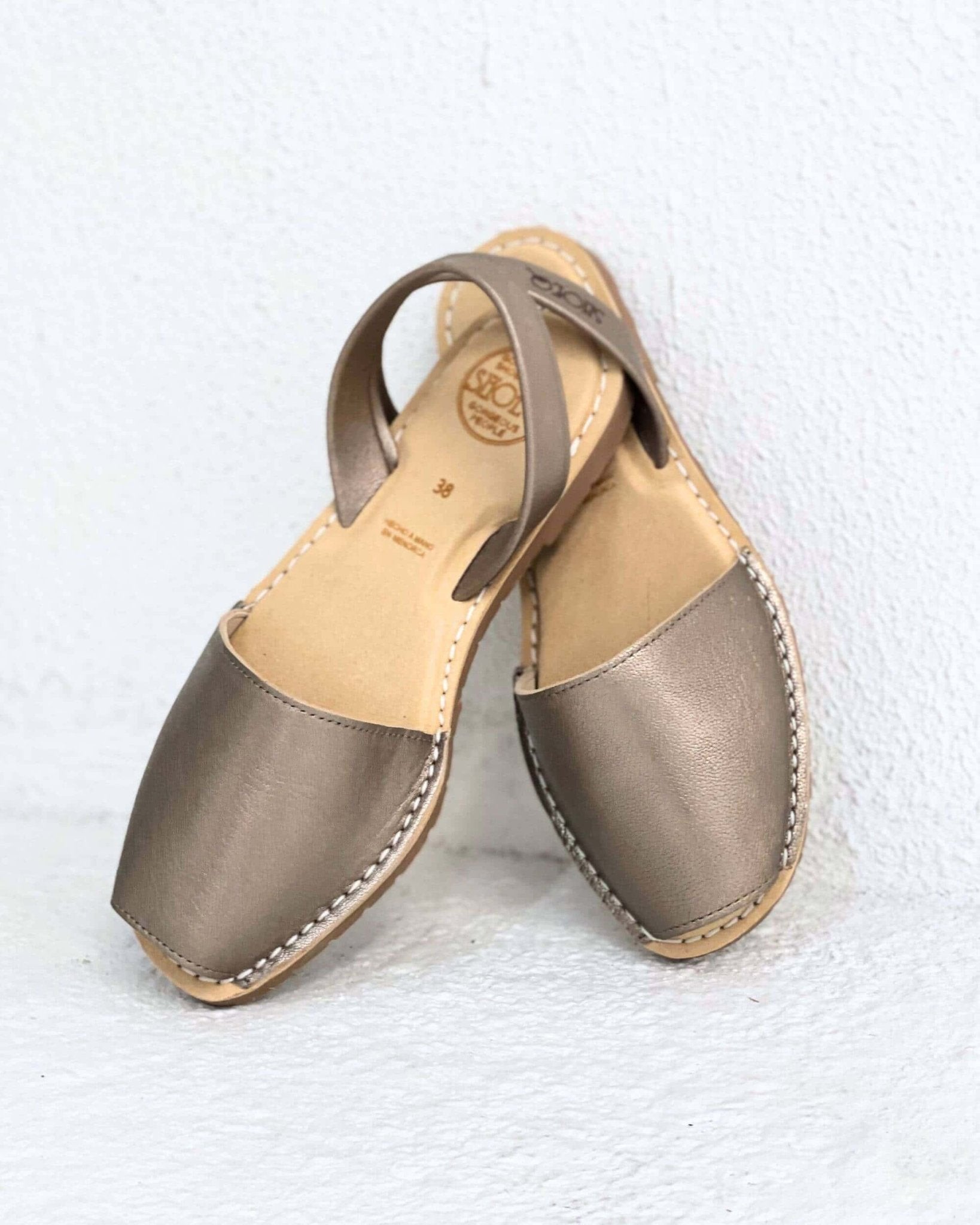 Handcrafted bronze flat shoes teachers retail workers Dubai