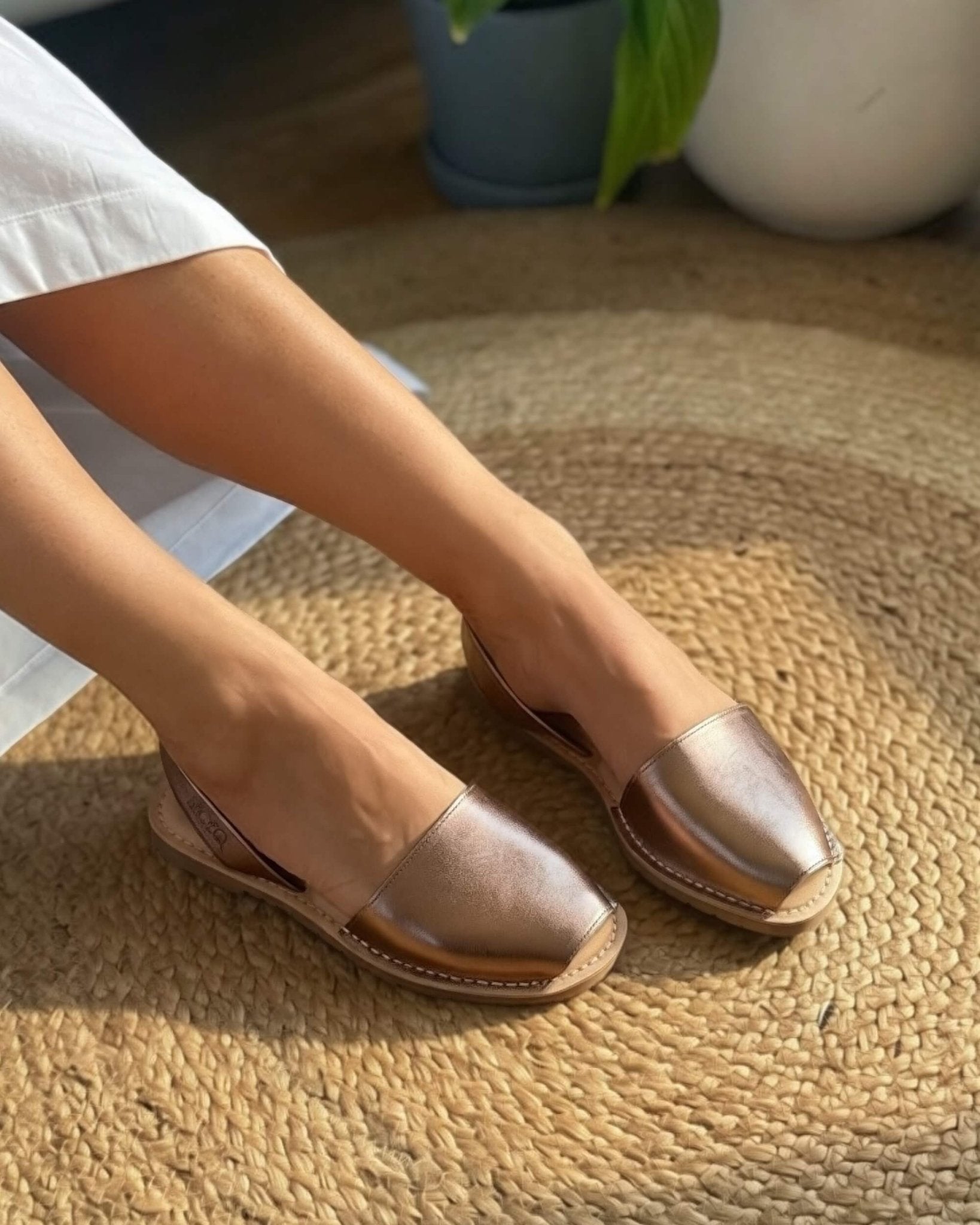 Luxe Avarca rose gold metallic leather comfortable flat sandal pair view — Shoeq
