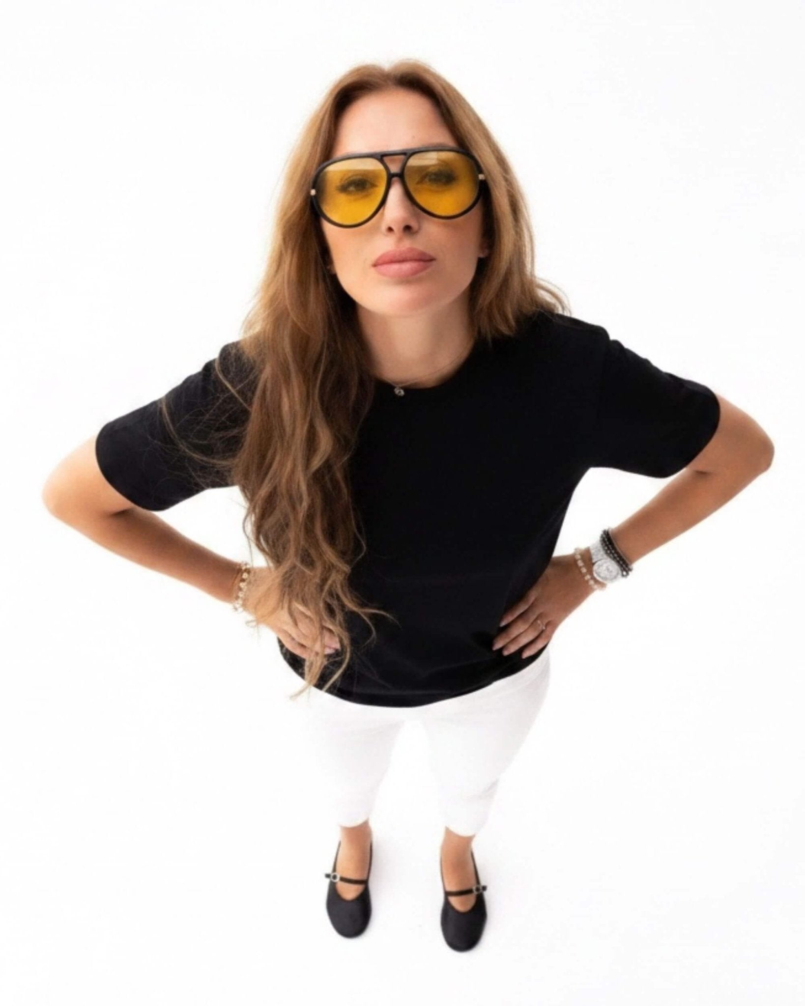 Black nappa leather Mary Jane shoes with ankle strap and silver buckle — wide overhead lifestyle studio shot | Mary Jane in Midnight by Shoeq