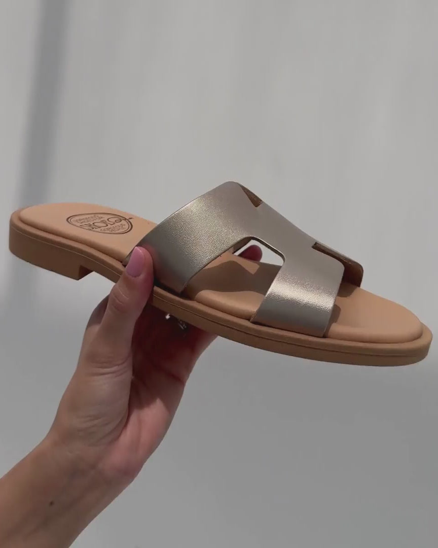 Versatile bronze slides Dubai smart casual beach warm metallic