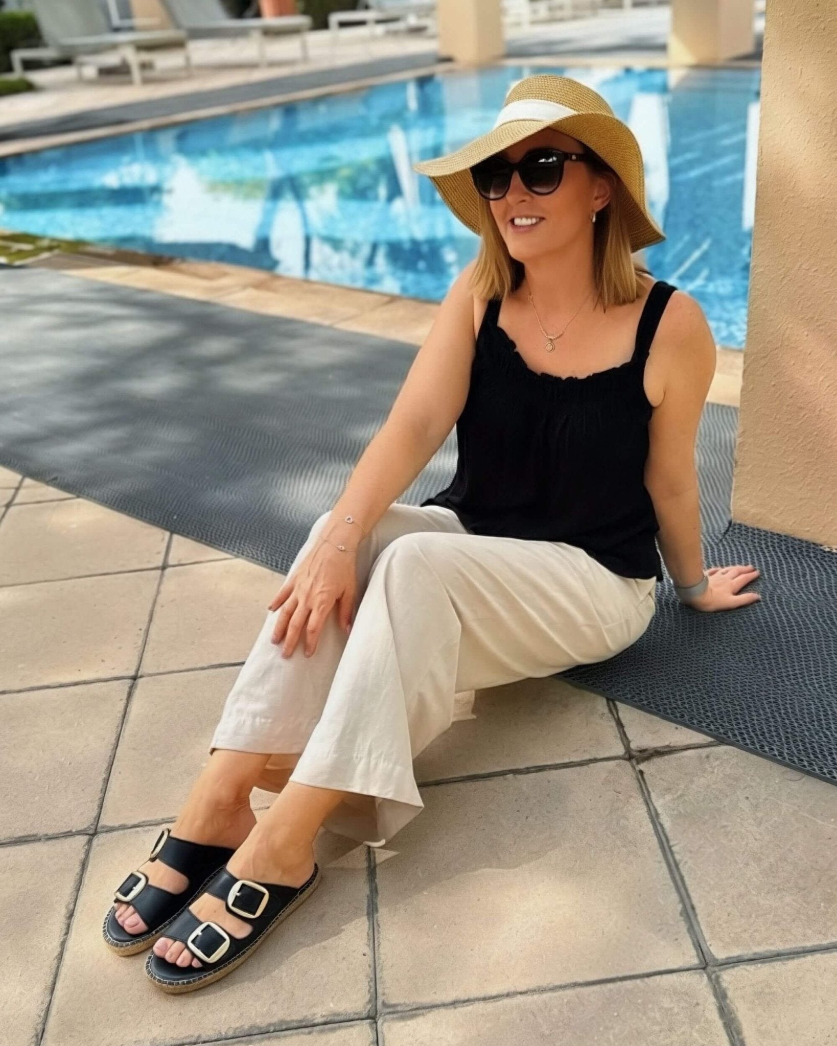 Urban Espadrille Slide in Charcoal — black leather espadrille slide styled with wide-leg trousers | Shoeq